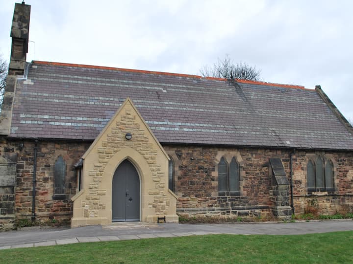 A W J M Quigley site in County Durham with completed stonework and scaffolding